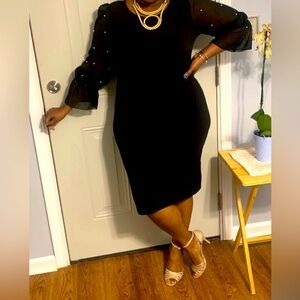 Ashley Stewart. Black formal dress with faux pearl beading on sheer sleeves.